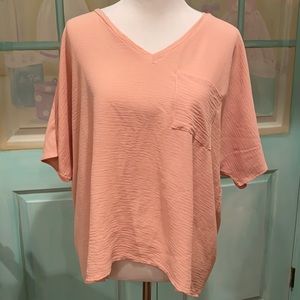 ee:some  top size S. Very relaxed large can fit